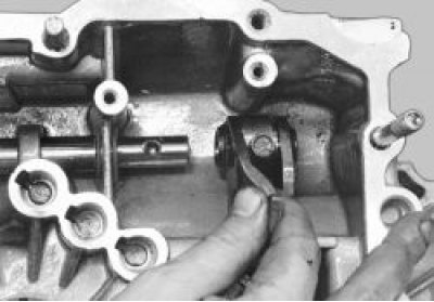 Выньте рычаг и шток