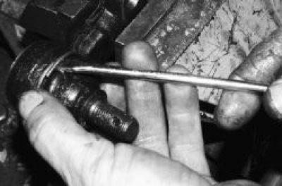 Снимите пружинное кольцо